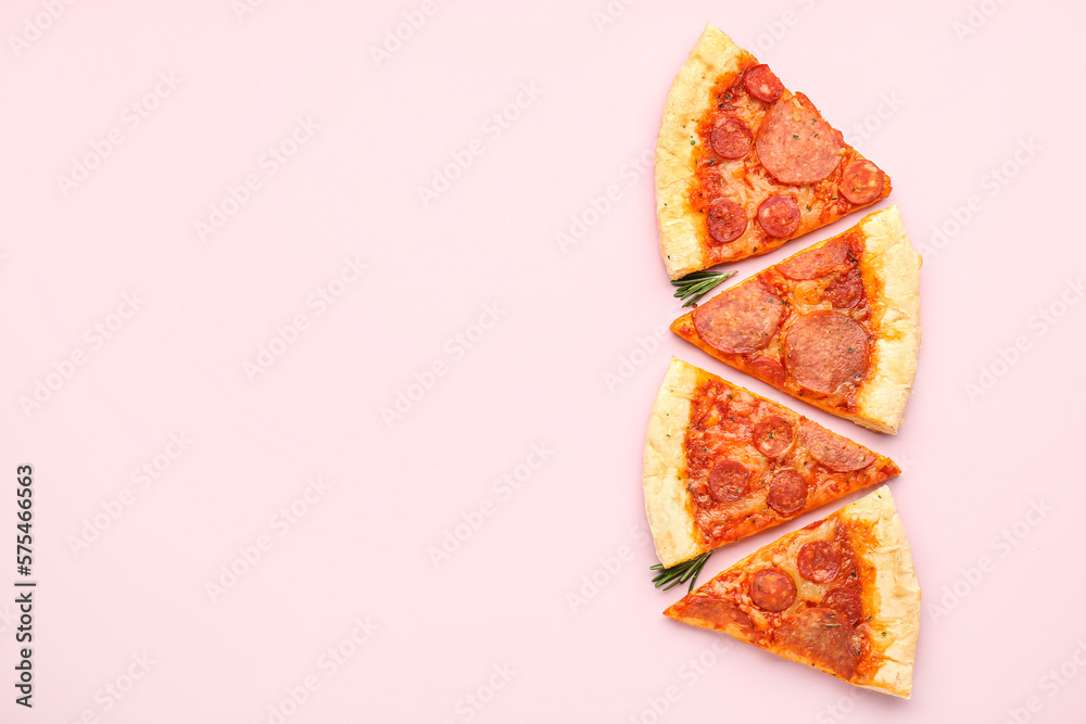 Slices of delicious pepperoni pizza on pink background