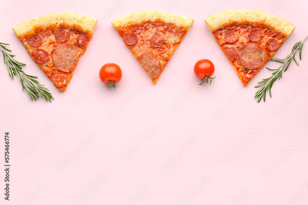 Composition with slices of delicious pepperoni pizza on pink background