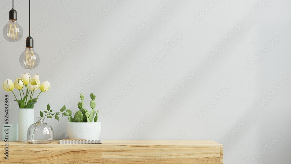 Wall mock up with flower vase,light blue color wall and wooden cabinet.