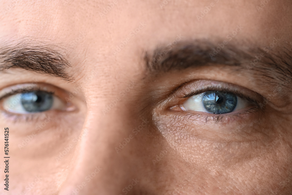 Mature man with blue eyes, closeup