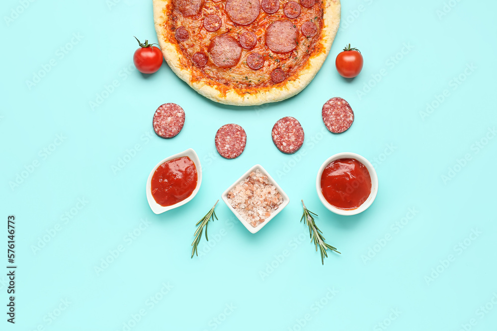 Composition with delicious pepperoni pizza and ingredients on turquoise background