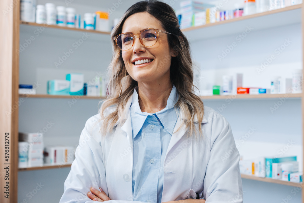 Female doctor standing in a pharmacy