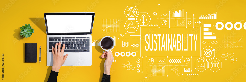 Sustainability theme with person using a laptop computer