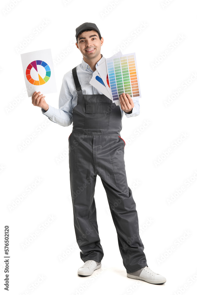 Male painter with color palettes on white background