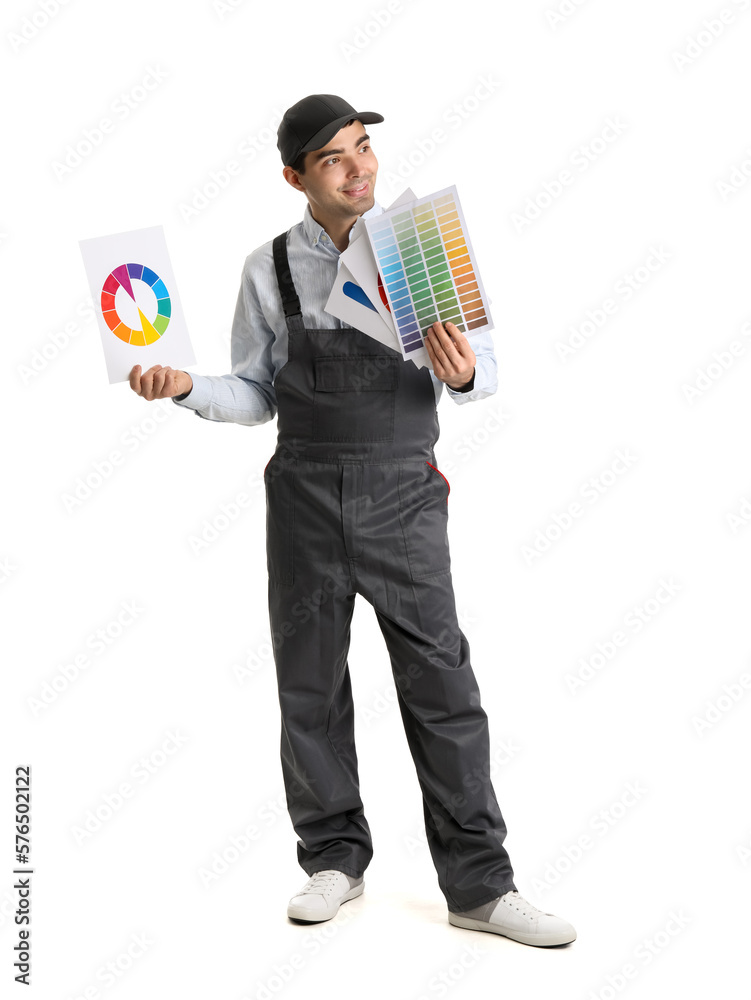 Male painter with color palettes on white background