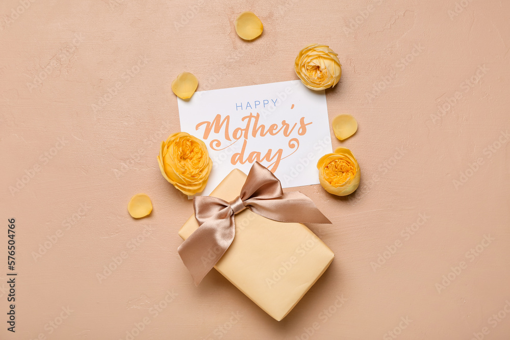 Composition with gift box, greeting card and beautiful rose flowers on color background. Mothers Da