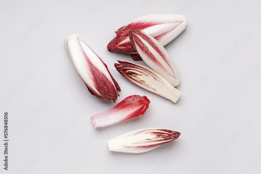 Bunches of fresh red endive on white background