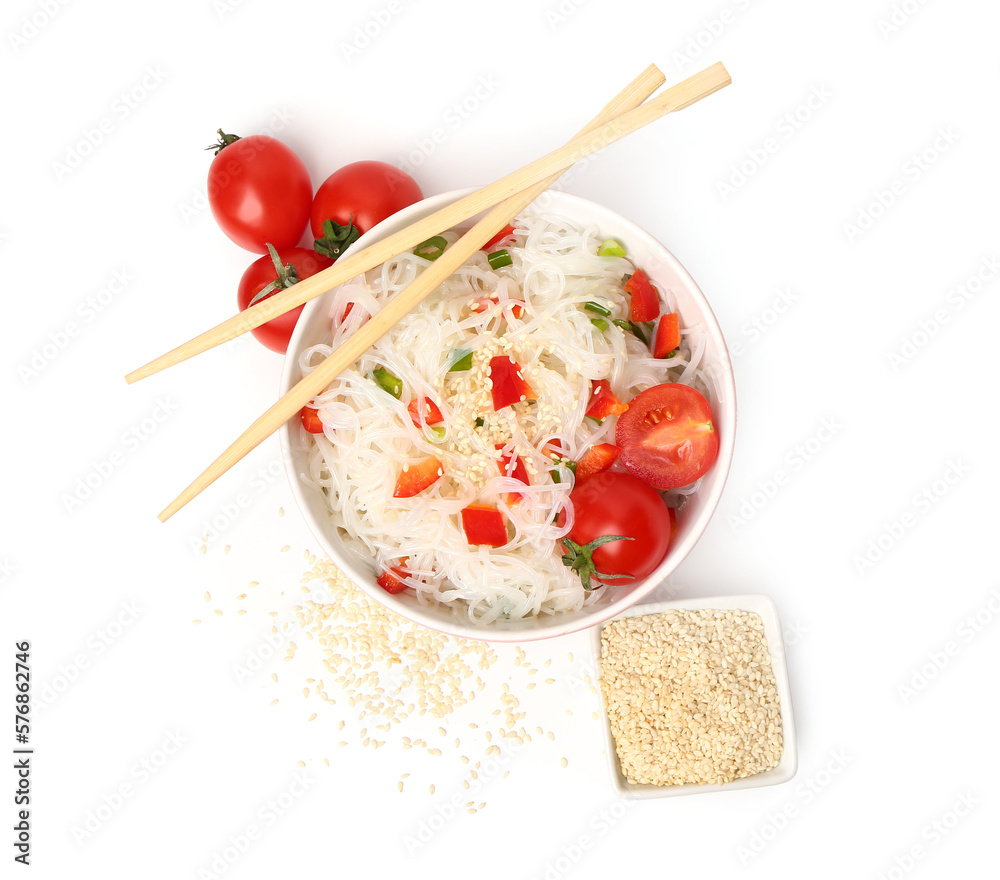 Bowl of tasty rice noodles with vegetables and sesame seeds on white background