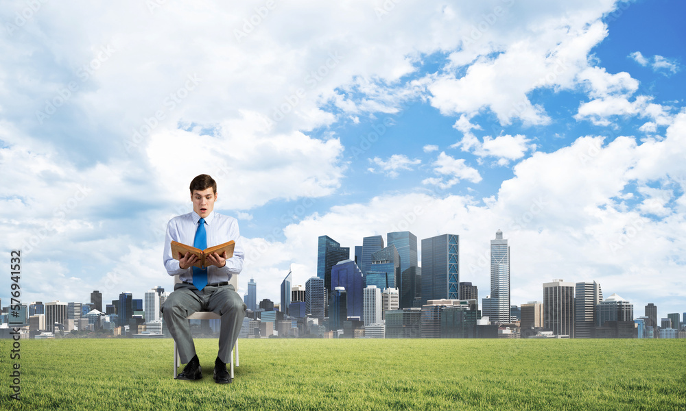 young businessman with book