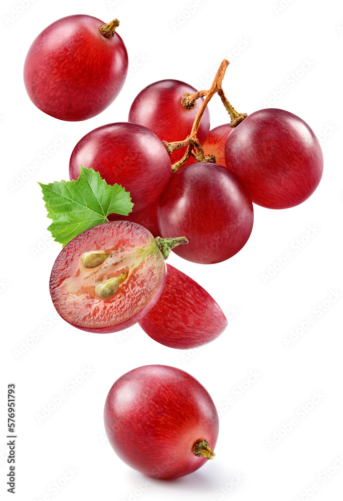 Grape isolated. Pink grape with leaves on white background. Violet red grapes flying collection. Ful