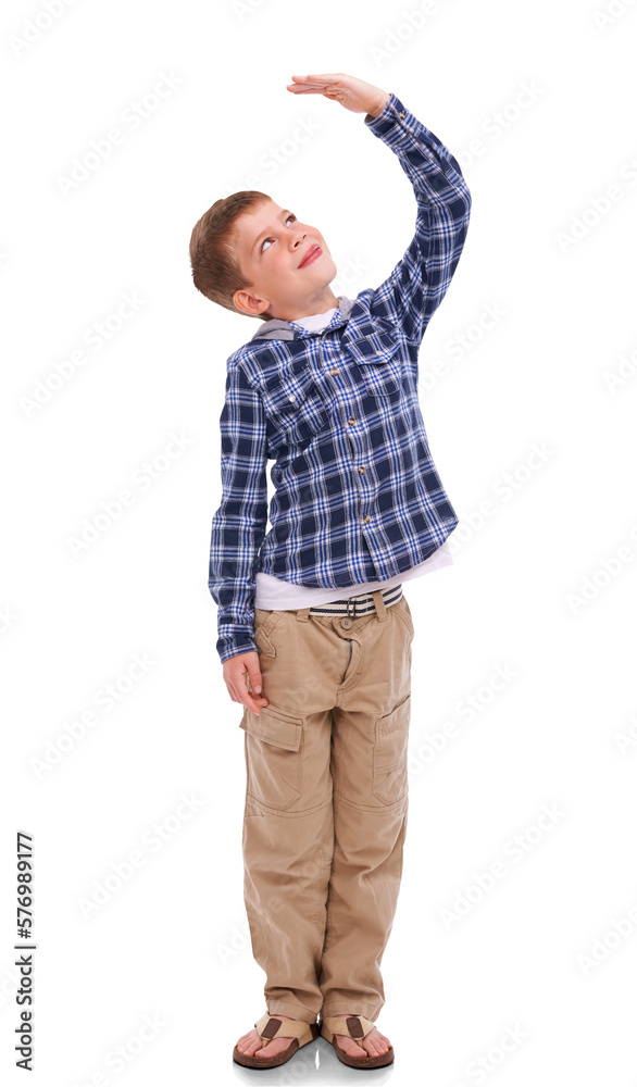 Adorable young children, dressed in casual checkered clothing, measure their height standing against