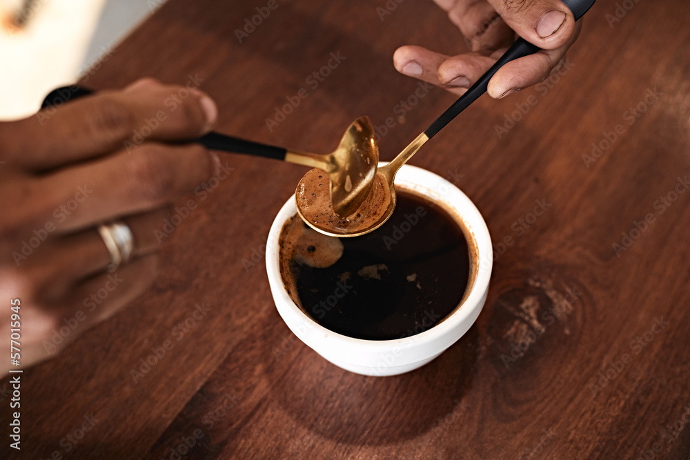 Barista preparing to test and inspecting the quality of coffee