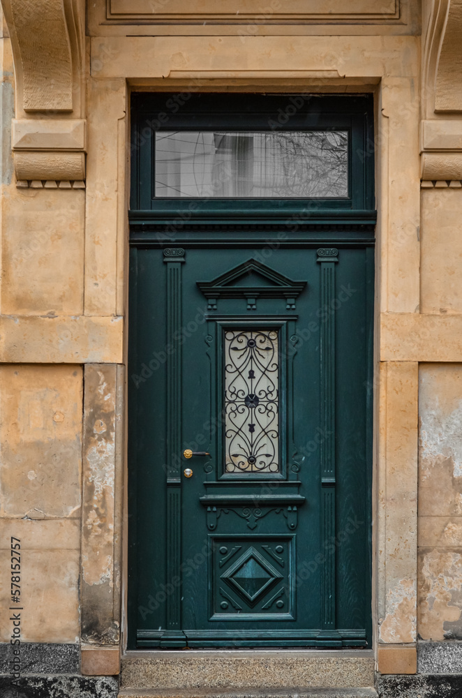 View of old building with green door