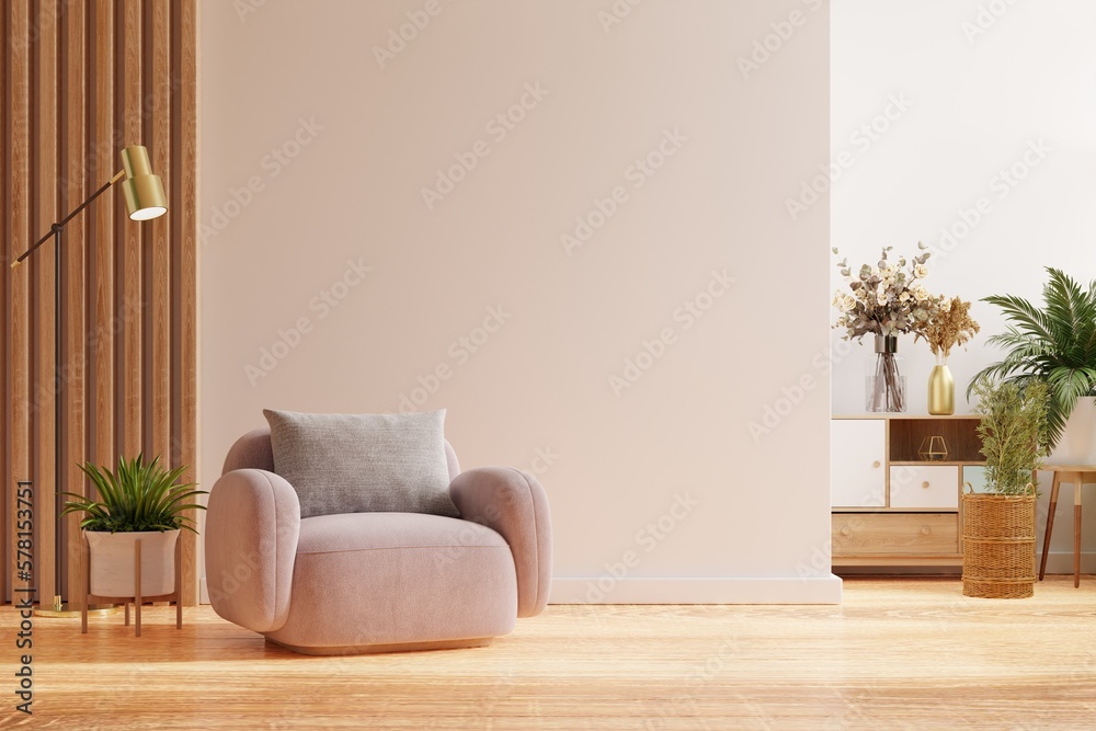 Wall mockup with pink armchair and accessory decor in living room.