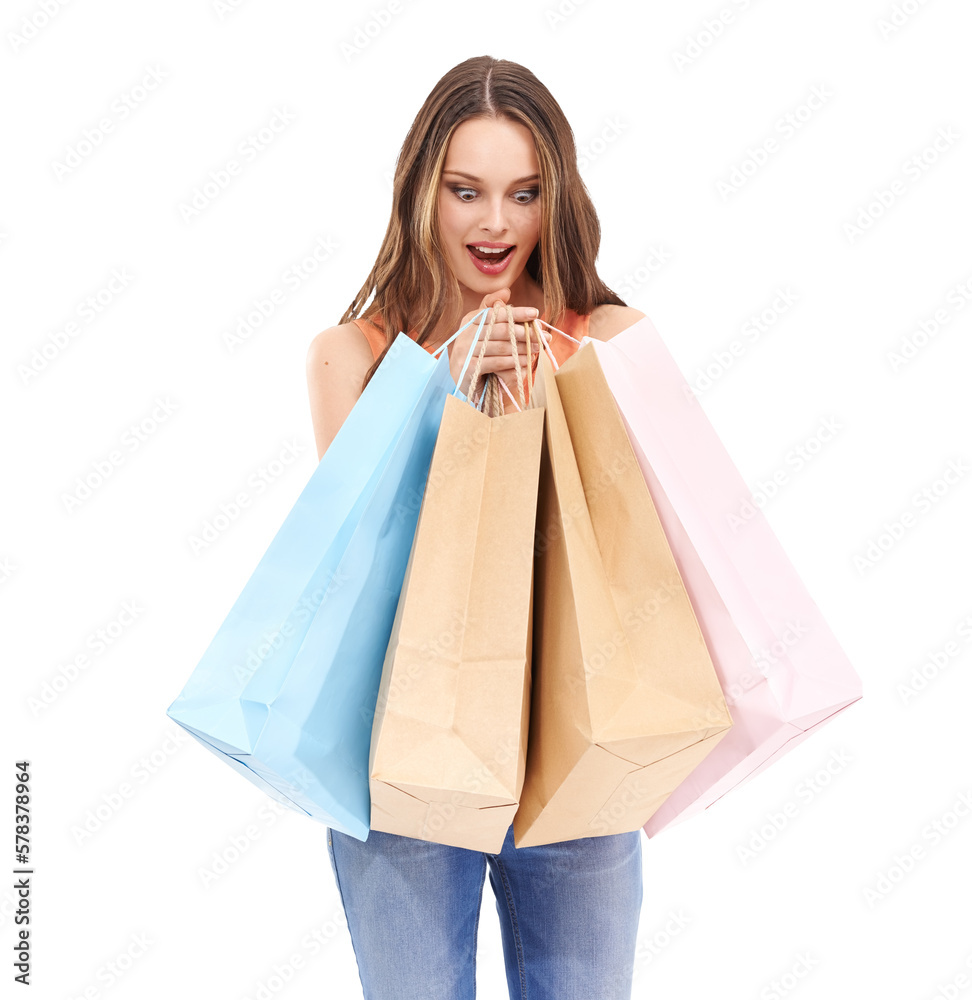 A beautiful female model in trendy casual attire, looking excitedly at a shopping bag after buying i