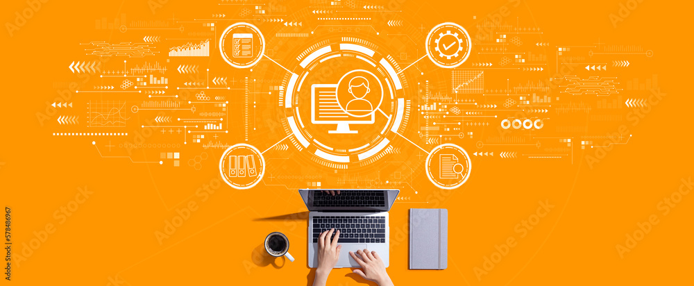 Document management system concept with person working with a laptop