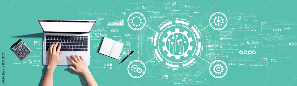 Automation concept with person using a laptop computer
