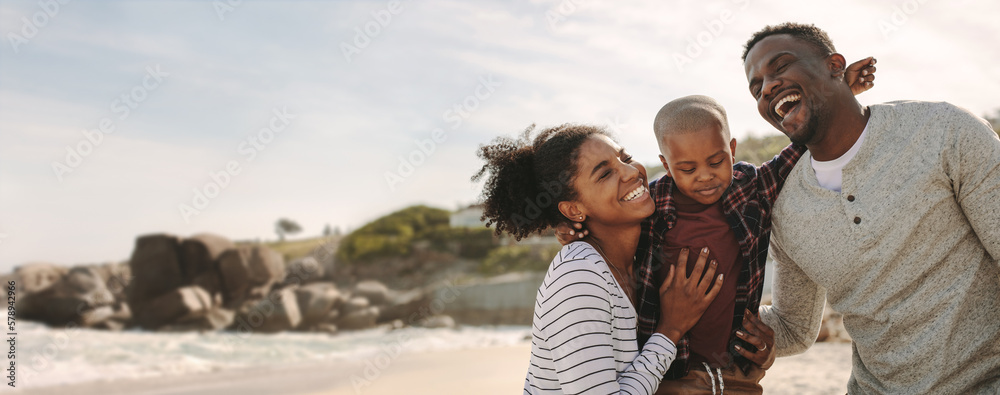 Beautiful family on vacation at beach