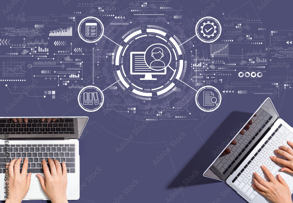 Document management system concept with people working together with laptop computers