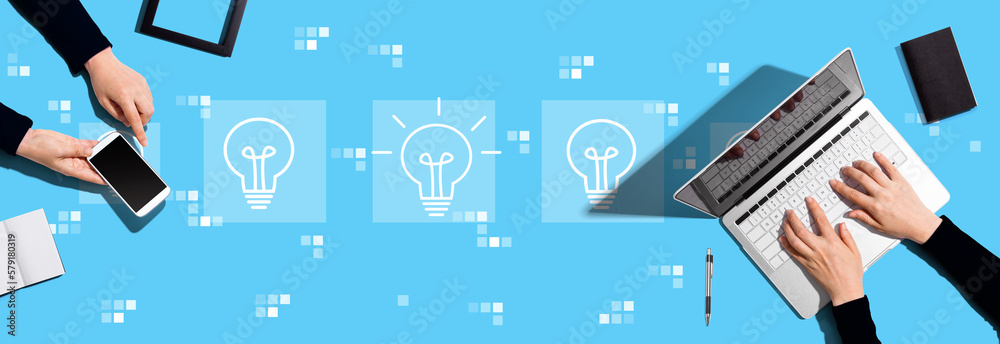 Idea light bulb theme with two people working together