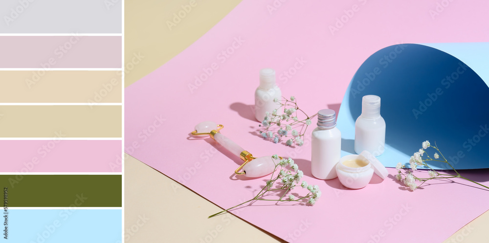 Different cosmetic products, facial massage tool and flowers on color paper. Different color pattern