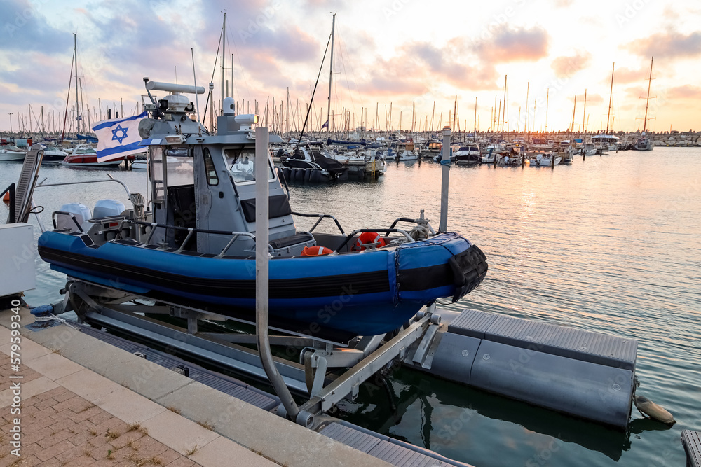 View of beautiful pier with yachts at sunset