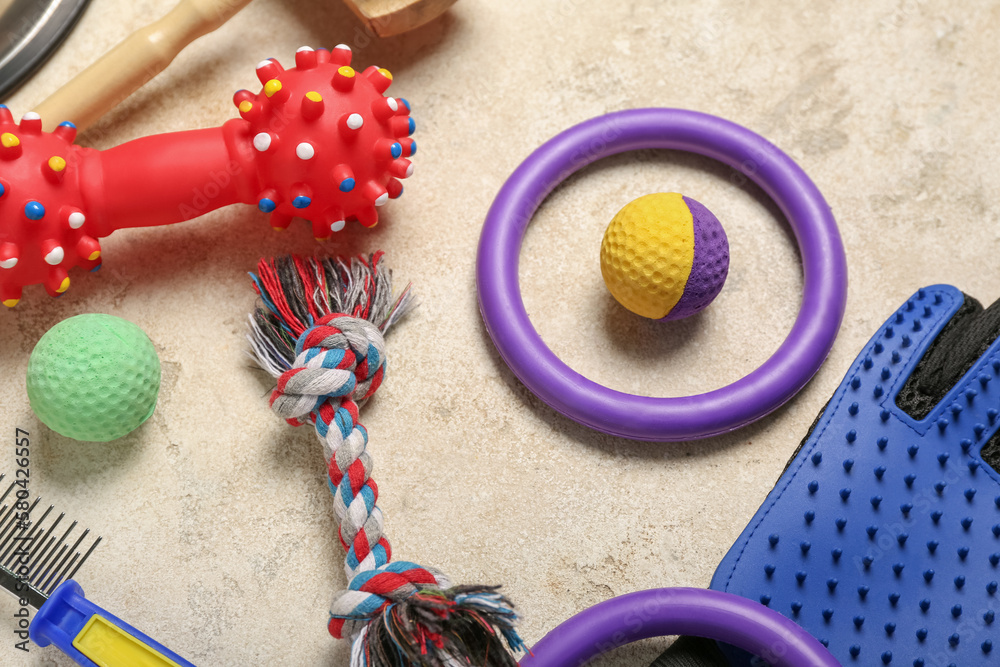 Set of pet toys on light background, closeup