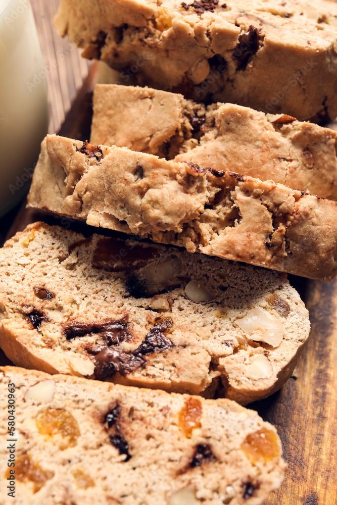 Delicious biscotti cookies on wooden background, closeup