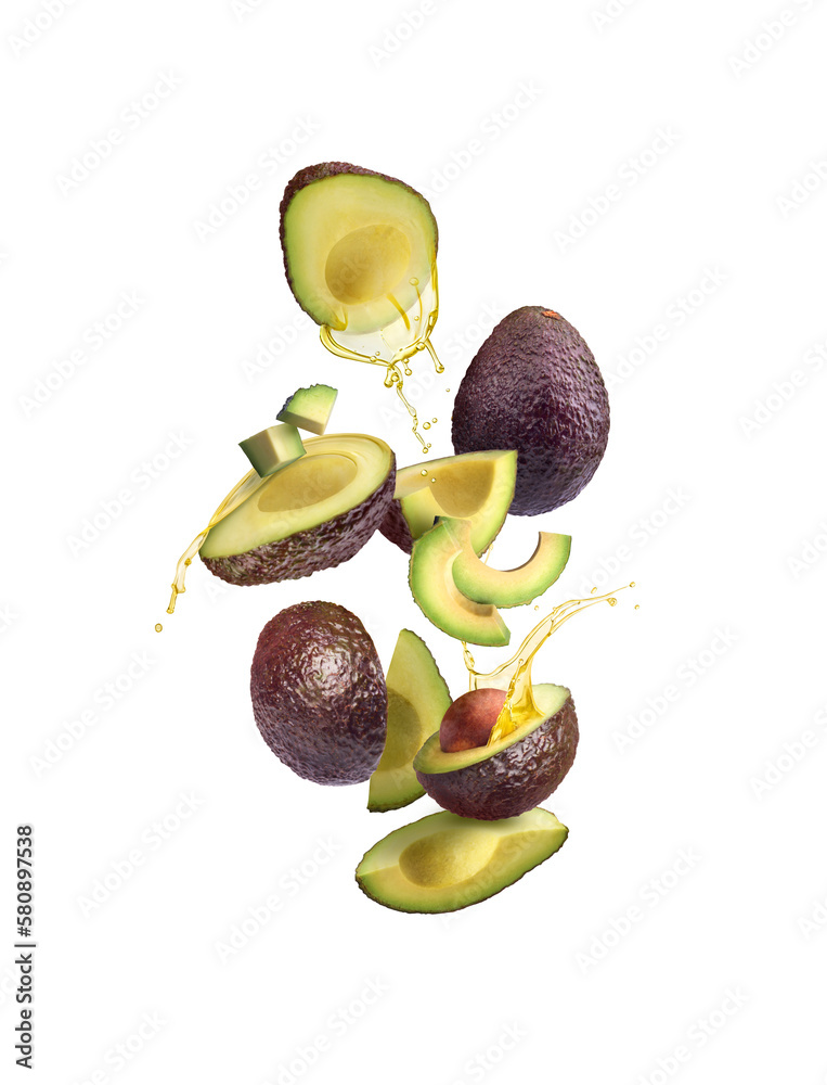 Avocado with splash of oil on white background