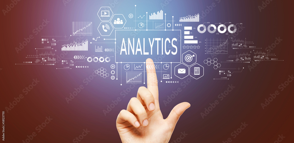 Analytics theme with hand pressing a button on a technology screen