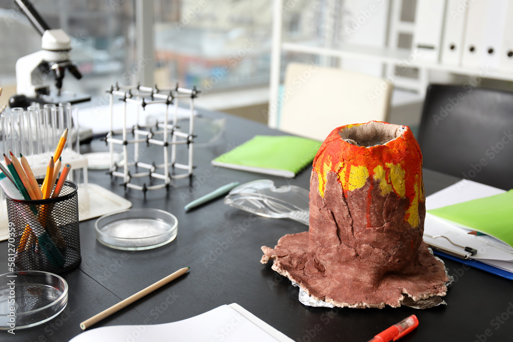 Chemical volcano on table in science classroom, closeup