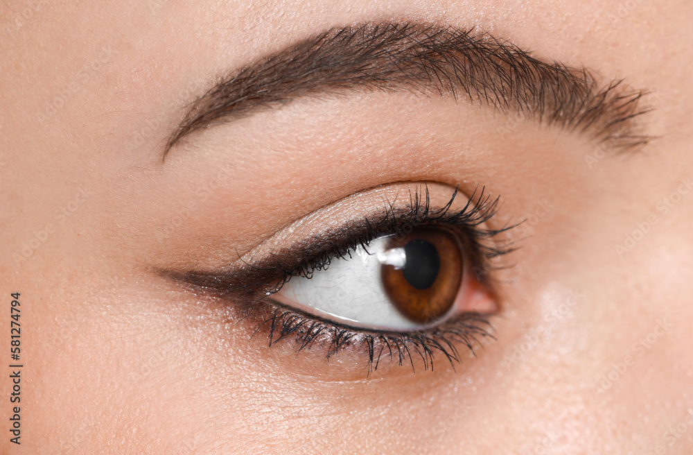 Young woman with brown eyes, close up