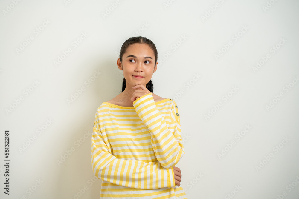 Young Asian woman isolated on white bakcground thinking