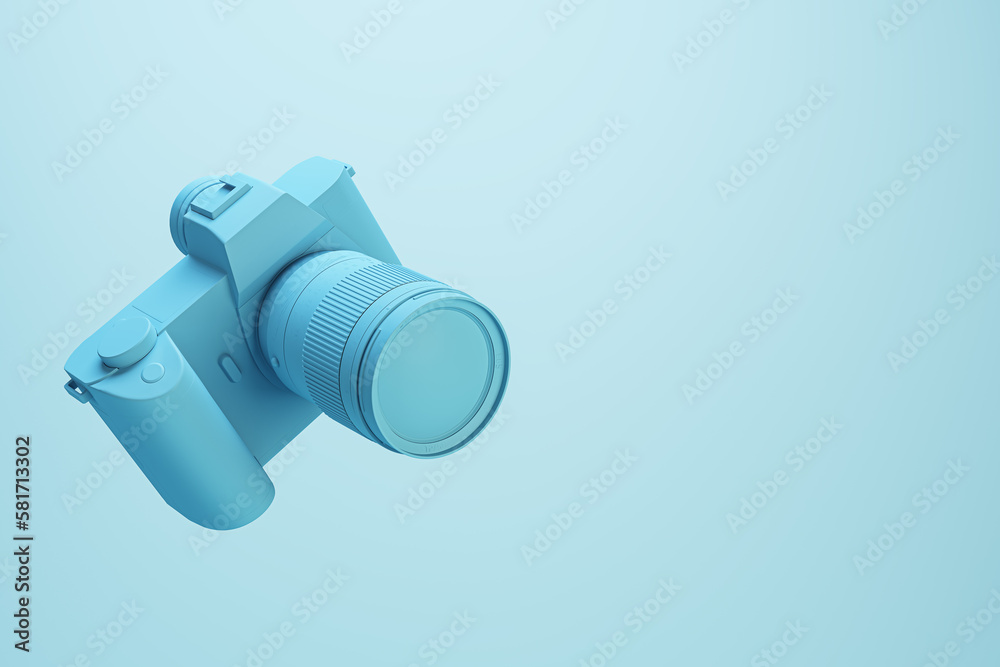 Creative minimal photo camera on light blue background with mock up place for advertisement. Technol