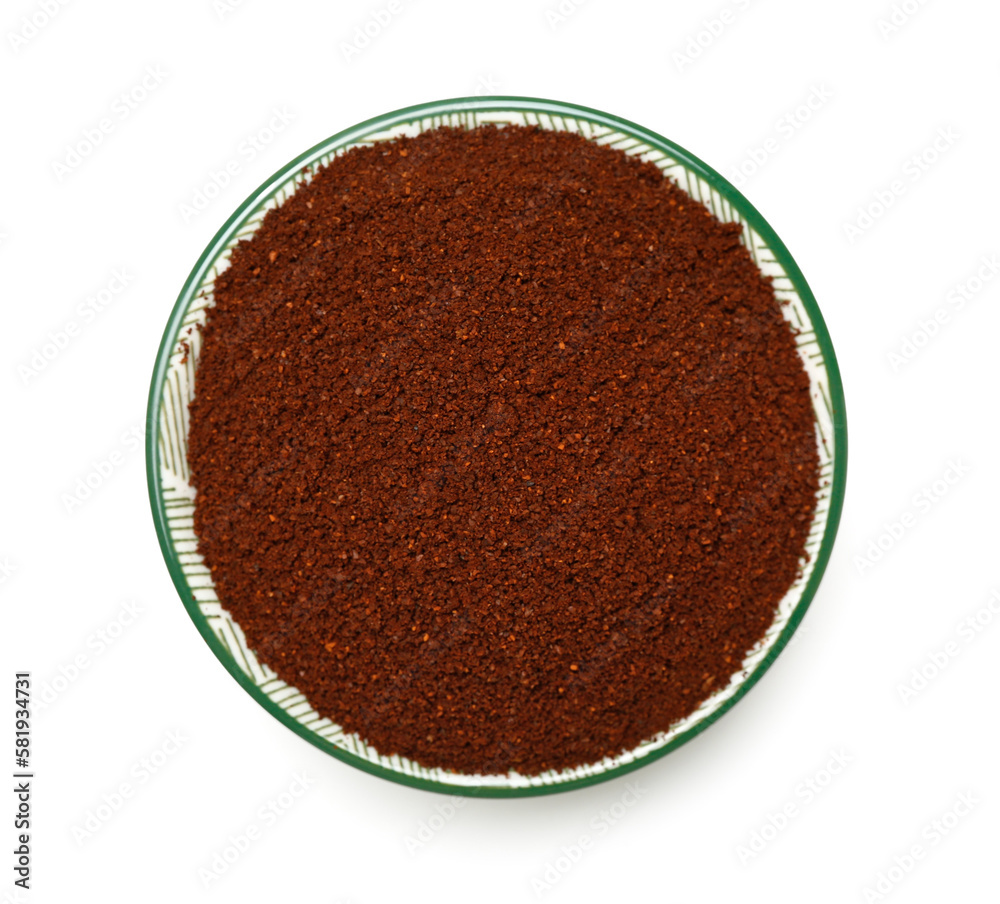 Bowl of coffee powder isolated on white background