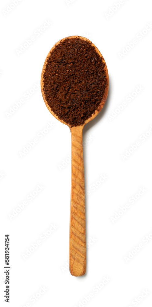 Wooden spoon with coffee powder isolated on white background