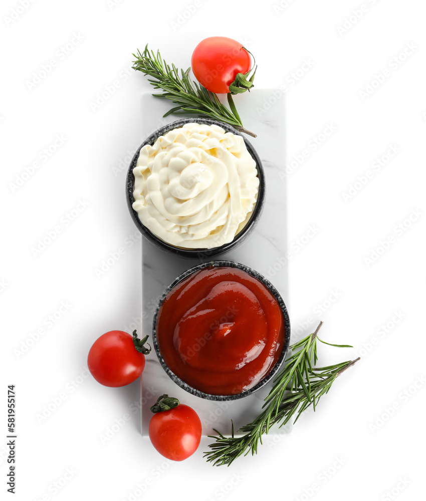 Board with different sauces in bowls and fresh tomatoes isolated on white background