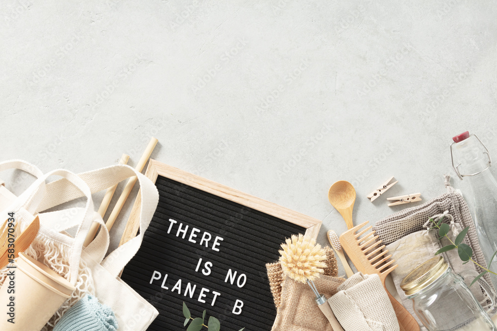 There is no planet b letter board and zero waste no plastic accessories on grey stone background