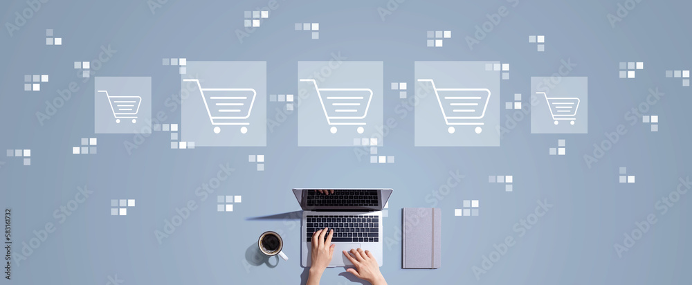 Online shopping theme with person working with a laptop