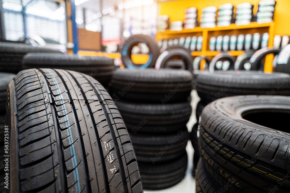 New tires, Car tires at warehouse. Car tires, Automobile industry.