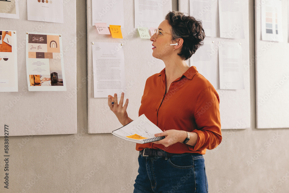 Mature businesswoman pitching her idea during a conference call