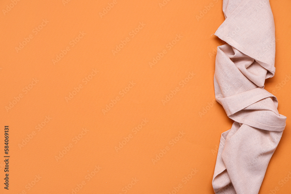 Twisted napkin on color background