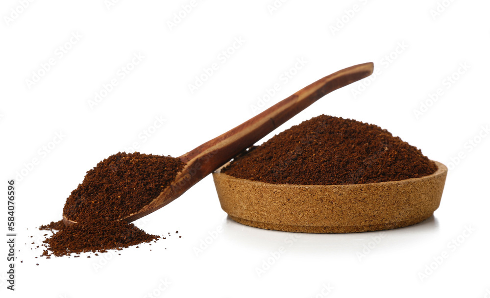 Bowl and spoon with coffee powder isolated on white background