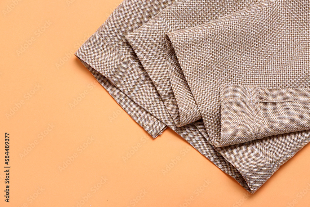 Clean napkins on orange background