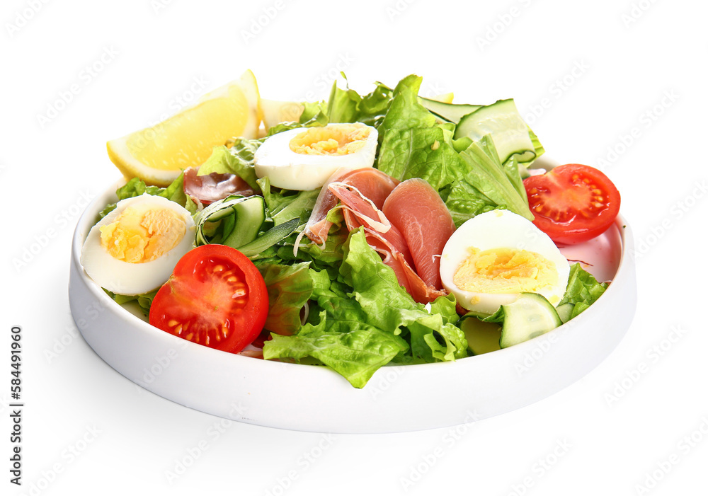 Plate of delicious salad with boiled eggs and jamon isolated on white background