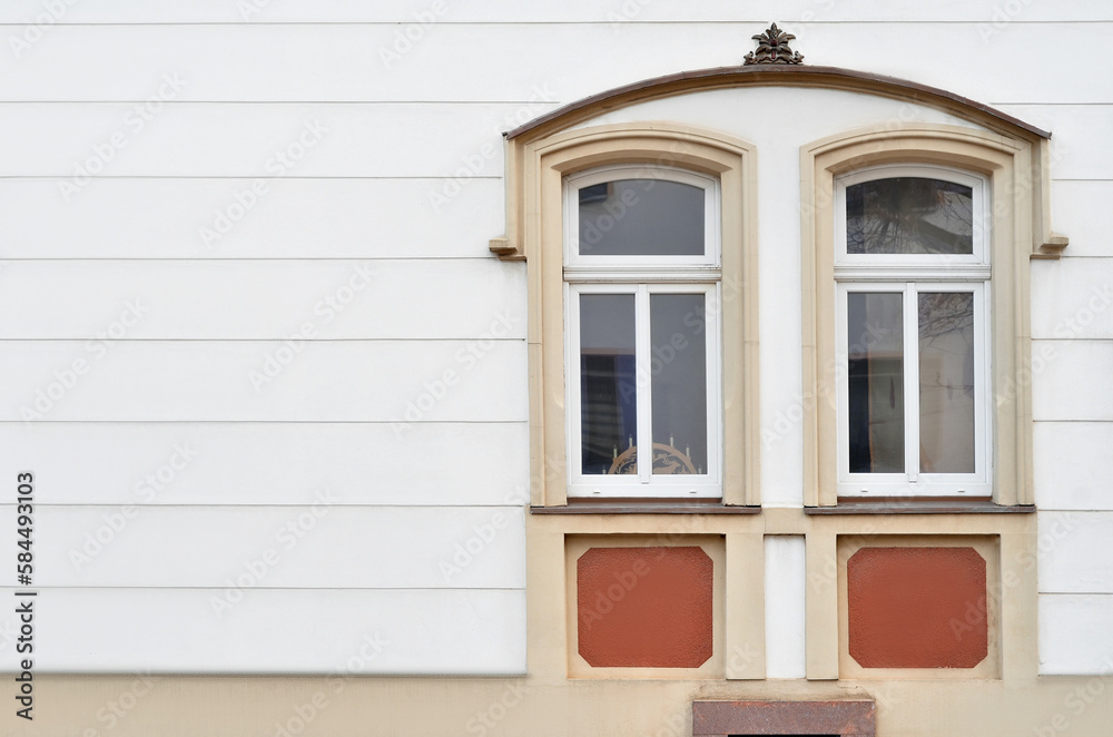 View of beautiful building with wooden windows