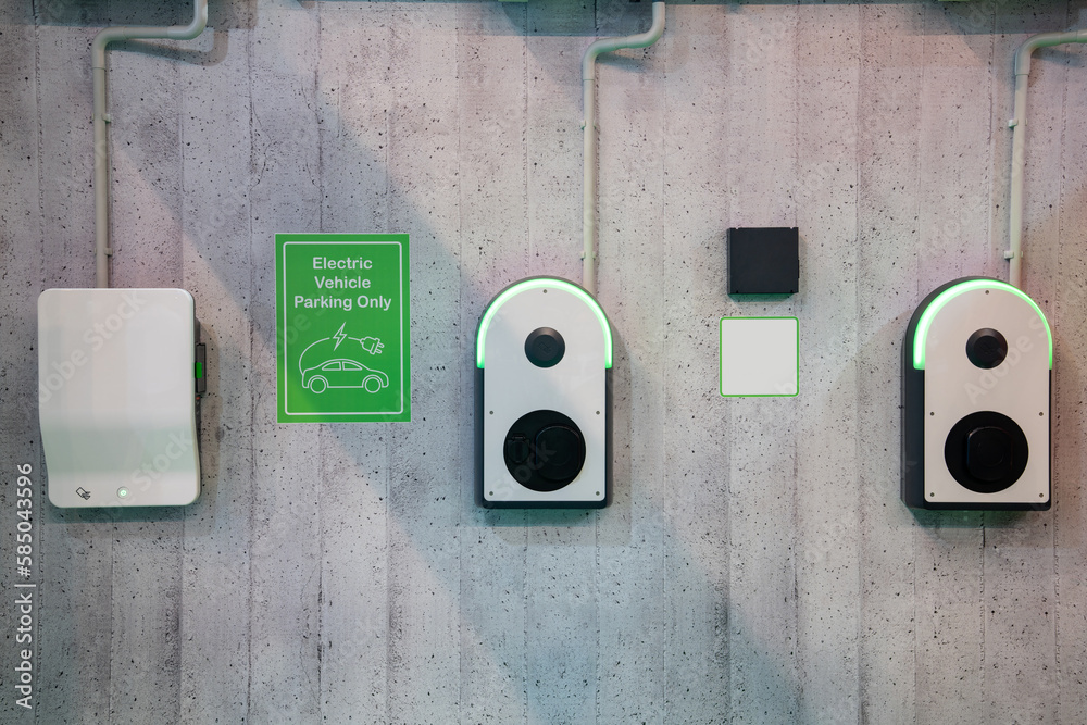 Charging stations for electric vehicles on a wall	