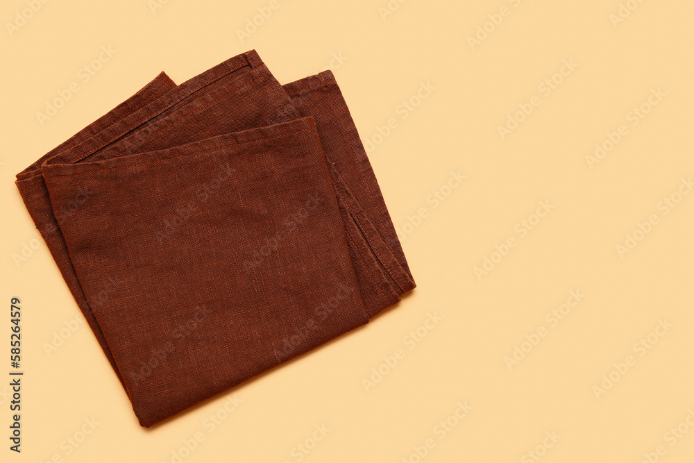 Folded clean napkin on color background