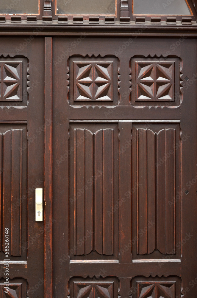 View of wooden door in city