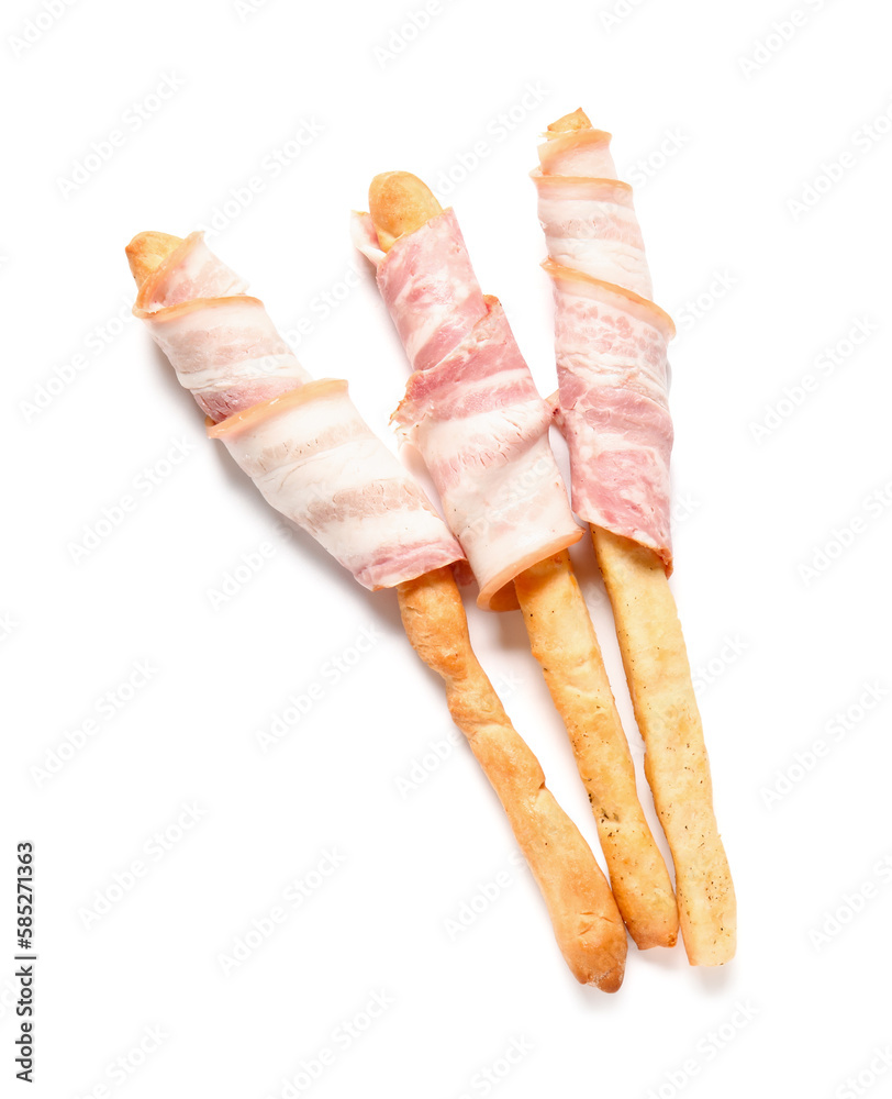 Tasty Italian Grissini with bacon on white background